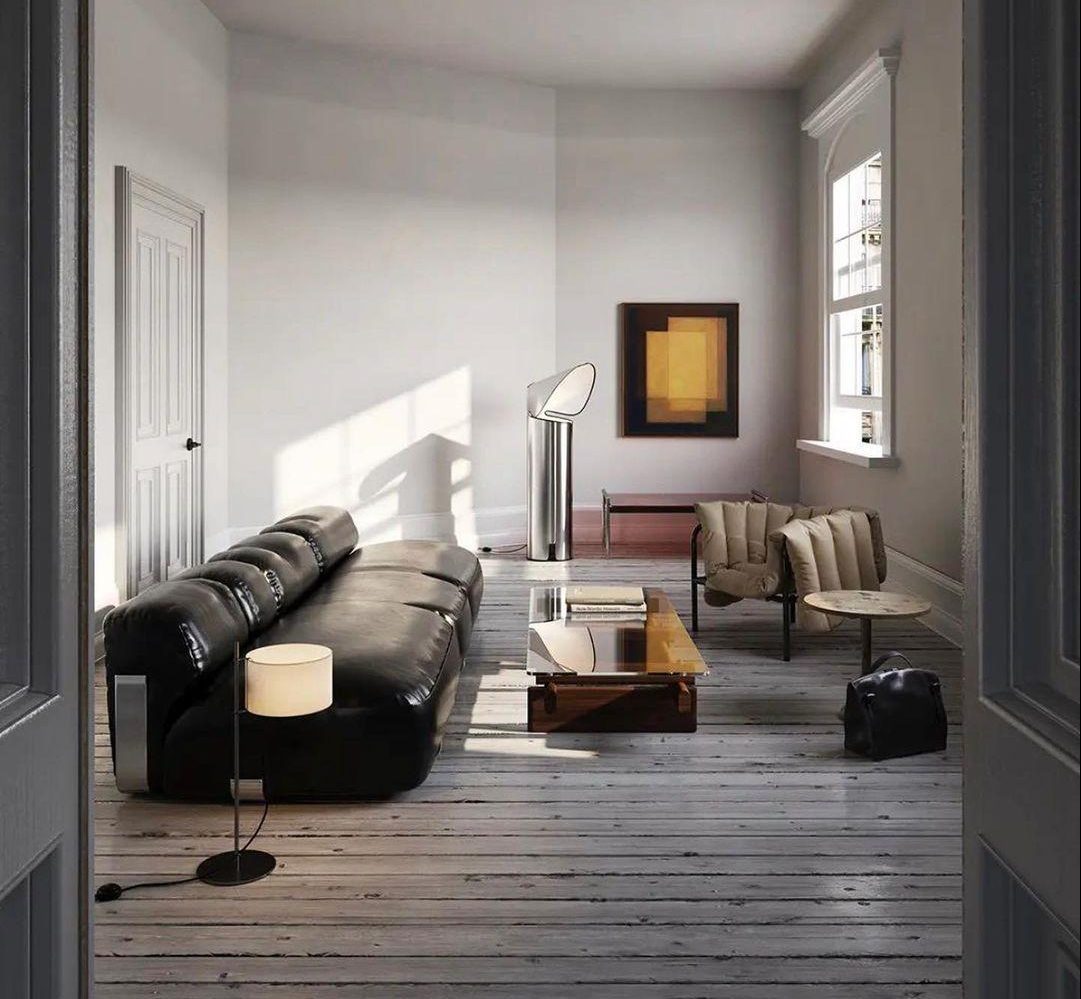 Ein aufgeräumtes, minimalistisches Wohnzimmer mit Designermöbeln und viel Raum zum Entspannen – ideal für Menschen, die Ordnung lieben.